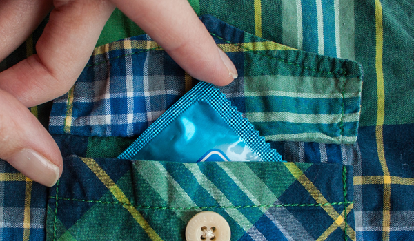a hand holding contraception